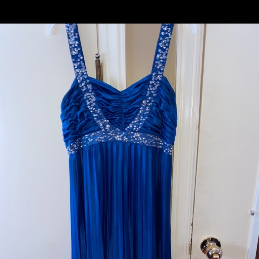 Medium sized blue long dress.